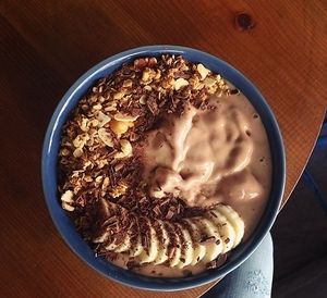 Cacau Bowl with Bananas and Rice Milk

Topping: Granola, Chocolat and Banana  at Bowl Lisboa in Lisbon