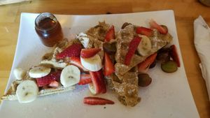 Waffles with fresh fruit and maple syrup at The Red Dot Kitchen in Wurtsboro