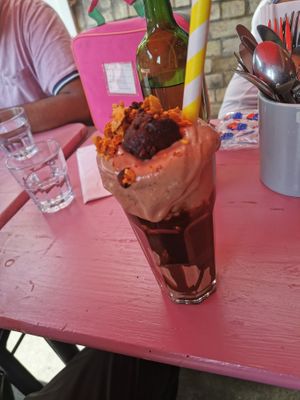Limited edition Brownie Honeycomb Shake: honeycomb ice cream, homemade honeycomb pieces, 1 slice of brownie topped with homemade chocolate sauce and even more homemade honeycomb. at DoppleGanger in Cambridge