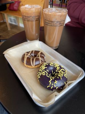 A couple of delicious Zumbro coffees (cinnamon and hazelnut. Yum!), an Ube donut, and a Choco Orange donut. What a treat!  at Old Abe & Co. in Rochester
