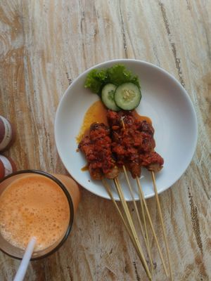 Sate sticks and healthy juice at Vegan Bali in Kuta