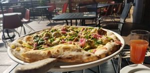 Voodoo Child Pizza is no longer served with Jackfruit! Now only roasted cauliflower. at Hearth Artisan Pizza in Anchorage