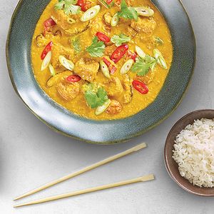 wagamama vegan samla curry with rice dish and chopsticks at Wagamama in Bratislava