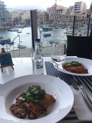 Lasagna overlooking the bay at Two Buoys Bistro in St Julians