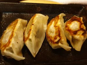 Gyozas filled with vegetables accompanied with ginger sauce at Itoya in Matsumoto