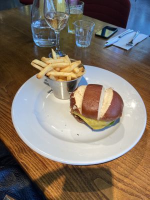 Moving Mountains burger with added vegan cheese   at Home in Manchester