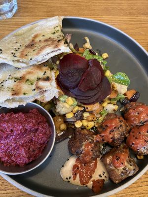 Falafel, beetroot and walnut dip, & salad with flatbread    at Home in Manchester