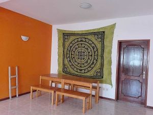 Shared dining room at Simabo's Backpackers' Hostel in Mindelo
