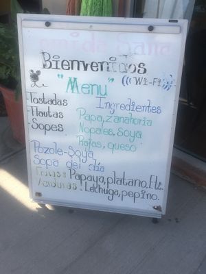 the menu out in front on the sidewalk at Soy Salud in Guerrero Negro