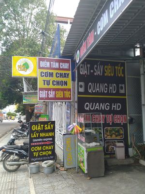 These are the signs seen from the sidewalk, as of July 7 2019. The sign "Vegetarian rice buffet" in the lower left caught my eye. at BoDe Chay in Phu Quoc
