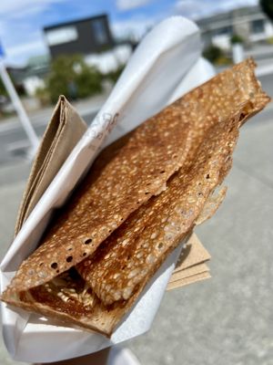 "Snickers" crepe. Made with peanut butter, chocolate chips, caramel and almonds.   at Charlie Brown's Crepes - Food Trailer in Wanaka