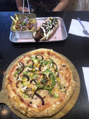 Notorious V.E.G pizza and a hot dog :) at Happy Friday Kitchen  in Oxford