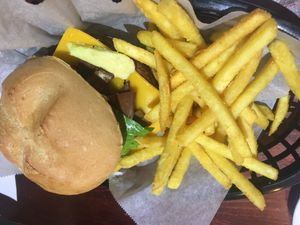 Soy patty burger with fries. Drool. at Happy Friday Kitchen  in Oxford