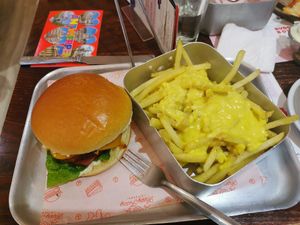 Seitan burger and cheesy fries 🤤 at Happy Friday Kitchen  in Oxford