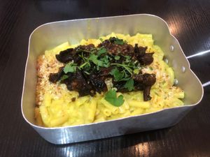 £6.50 for the mac n cheese, £1.50 for the aubergine bacon. Gigantic portion for a side dish, glad I only ordered this, would not have been able to ear anything else, very filling at Happy Friday Kitchen  in Oxford