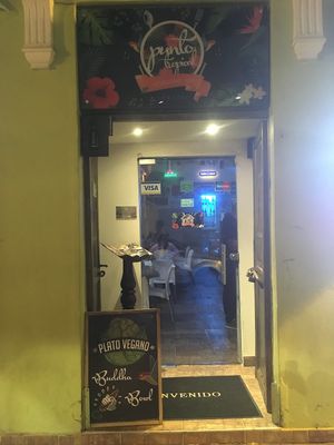 Exterior sign at Punto Tropical in Cartagena