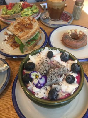 pitaya smoothiebowl, blt sandwich, avocado toast with strawberries & donut  at Farm Girl - Sweaty Betty in London