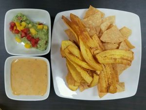 plantain chips, vegan queso and guacamole at 5 Elementos in West Hollywood