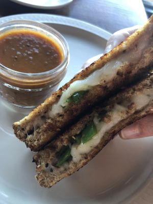 Vegan jalapeño grilled cheese with red pepper soup at The Acre - Wyoming Blvd in Albuquerque