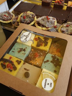 Raw cakes at the My Goodness market stall. Raw vegan truffles, raw vegan mince pies, peanut butter power bars.  at My Goodness in Cork