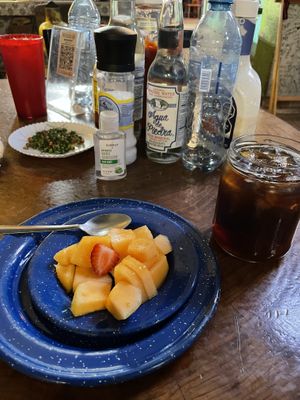 “Desayuno del día” it’s all day, It comes with your plate of choice plus fruit of the day & cafe de olla, I got it with Ice  at Trece Lunas in Monterrey