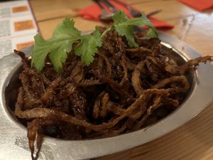 Onion Ragi Pakora (vg) – onion fritters made with pearl Millet flour, green chillies, coriander, curry leaves  at Dosa Kitchen in Newcastle Upon Tyne