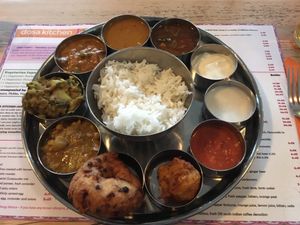 Vegan thali set menu (dosa and poppadom removed to show dishes) at Dosa Kitchen in Newcastle Upon Tyne