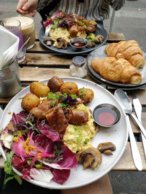Breakfast Pancakes with scrambled Tofu, rice paper "bacon" and Patatas bravas. at Aujourd'hui Demain Cafe in Paris