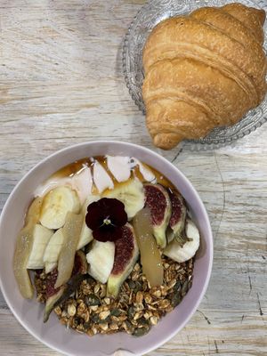Granola and croissant  at Aujourd'hui Demain Cafe in Paris