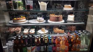 Vitrine desserts at Aujourd'hui Demain Cafe in Paris