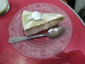 Matcha cheesecake, too sweet for my taste but definitelly the best cheesecake I've ever tasted! at Aujourd'hui Demain Cafe in Paris