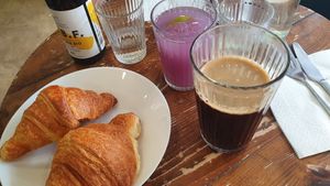 Vegan croissants, coffee, their "ultraviolet juice", beer at Aujourd'hui Demain Cafe in Paris