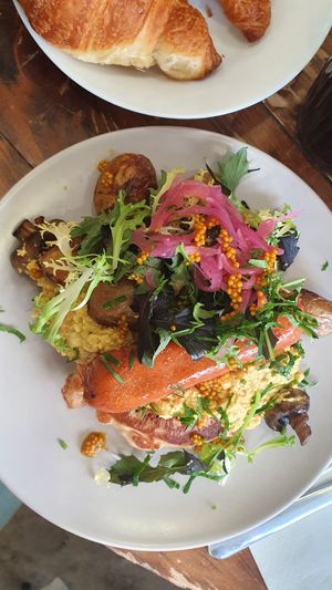 Brunch (pancakes, beyond meat, scrambled tofu, potatoes, mushrooms...) at Aujourd'hui Demain Cafe in Paris