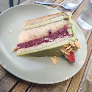 Layer cake raspberry and matcha  at Aujourd'hui Demain Cafe in Paris