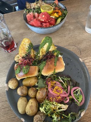 Summer salad and fish burger  at Aujourd'hui Demain Cafe in Paris