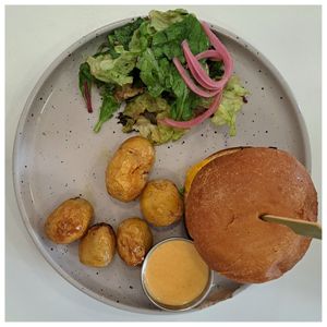 classic cheddar burger 🌱 at Aujourd'hui Demain Cafe in Paris