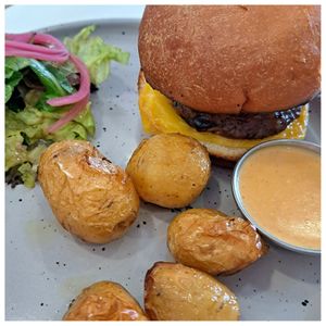 classic cheddar burger 🌱 at Aujourd'hui Demain Cafe in Paris