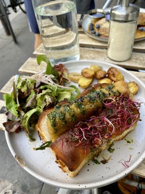 Ultimate Selfish Burger — fish sandwich on a brioche bun with homemade tartar sauce. Magnifique !  at Aujourd'hui Demain Cafe in Paris