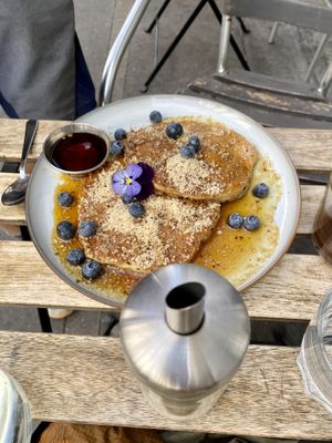 Pancakes with blueberries and hazelnut   at Aujourd'hui Demain Cafe in Paris