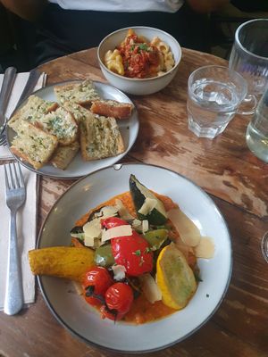 (Top) mac n cheese (middle) Garlic bread (bottom) Ratatouille at Aujourd'hui Demain Cafe in Paris