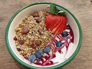 Granola Bowl Red Fruit (soy yoghurt, red berries, almonds, maple leaf syrup, blueberry) at Aujourd'hui Demain Cafe in Paris