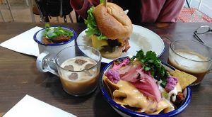 Burgers, nachos, and coffee  at Aujourd'hui Demain Cafe in Paris