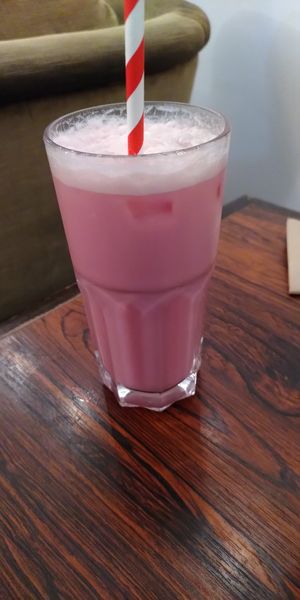 Pink latte at Aujourd'hui Demain Cafe in Paris