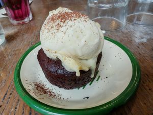 chocolate mi-cuit with vanilia ice cream at Aujourd'hui Demain Cafe in Paris