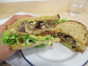 Sandwich with seitan, mushrooms, cheddar and onions at Aujourd'hui Demain Cafe in Paris