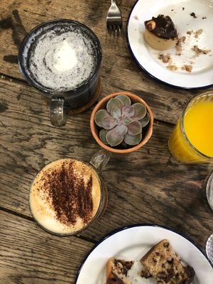 Black Forest latte, cappuccino and Vego muffin at Aujourd'hui Demain Cafe in Paris