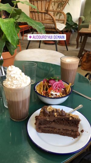 Nacho bowl and Nutella cake with hot  chocolate  at Aujourd'hui Demain Cafe in Paris