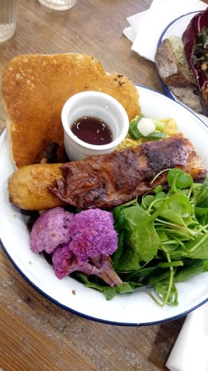 Pancake, scrumble tofu, beyond sausage, tofu-bacon, potatoes, mushroom, salad, maple syrup at Aujourd'hui Demain Cafe in Paris
