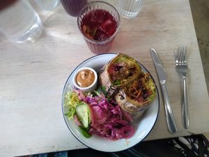 Breakfast burrito and infusion hibiscus at Aujourd'hui Demain Cafe in Paris