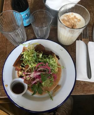 Breakfast plate and peanut latte at Aujourd'hui Demain Cafe in Paris